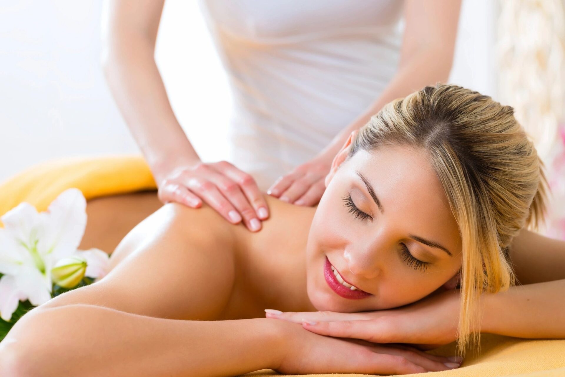 Wellness - woman getting body massage